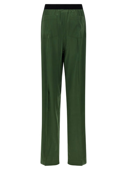 Casual Pants by Tom Ford for women in satin silk velvet bicolour & green features a polished silhouette with a polished straight-leg, reaching a polished long and finished with a polished .