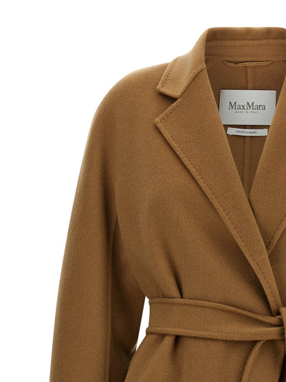 Trench Coat by Max Mara for women in cashmere beige presents a distinguished silhouette, artfully detailed with pockets and a distinguished lapel neckline for a sophisticated, distinguished finish.