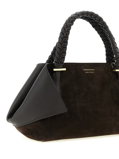 2-in-1 Shoulder & Crossbody Handbag by Ferragamo for women in suede leather brown features a contemporary silhouette, showcasing a secure zipper, ample , and contemporary crossbody-strap, shoulder-strap, adjustable-strap & handle for a sophisticated look.