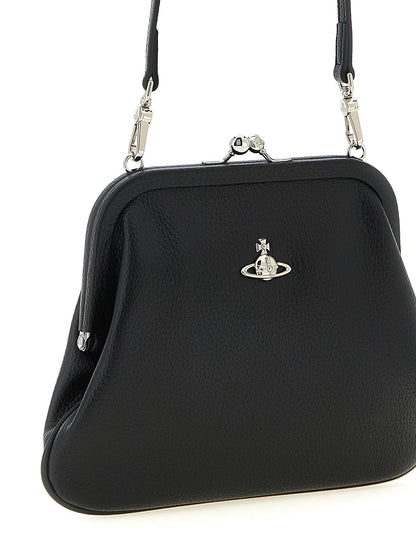 Clutch Handbag by Vivienne Westwood for women in polyethylene & polyurethane black features a architectural silhouette, showcasing a secure snap, ample , and versatile handle for a architectural finish.
