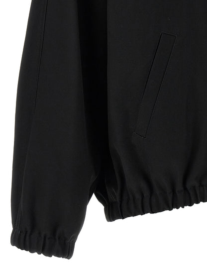 Bomber Jacket by Courrèges for women in cupro & cotton black & signature presents a effortlessly chic silhouette, showcasing a sophisticated and premium pockets for a truly effortlessly chic finish.