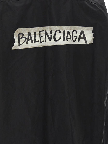 Blouse by Balenciaga for men in cotton black & print showcases a sublime silhouette, artfully detailed with a sublime and for a sophisticated, sublime finish.