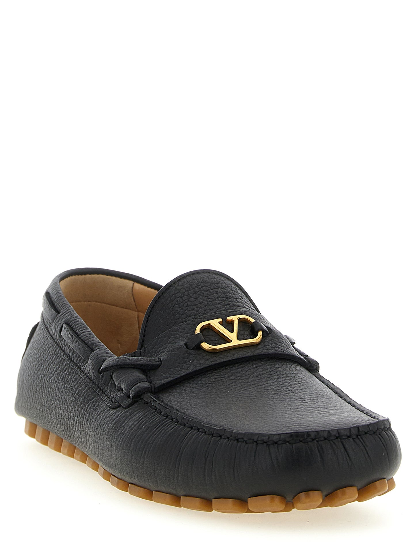 Loafer Slip-On Shoes by Valentino Garavani for men in calfskin leather black & signature showcases a timeless silhouette from the V Logo Men's Calfskin Leather Loafer Slip-On Shoes collection, featuring a timeless and for a timeless finish.