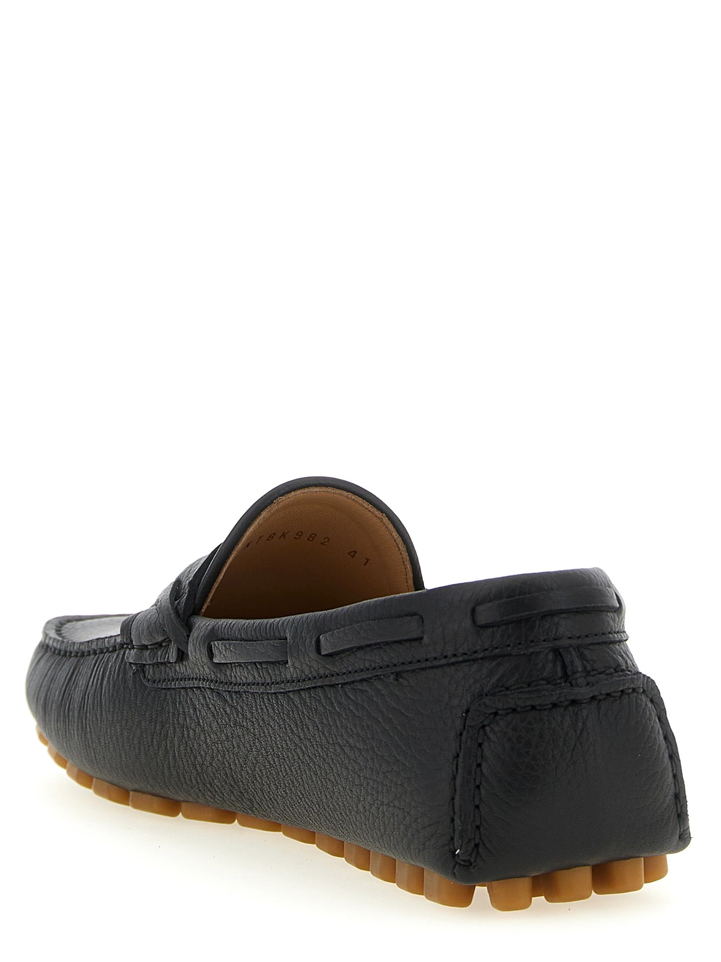 Loafer Slip-On Shoes by Valentino Garavani for men in calfskin leather black & signature features an ergonomic silhouette, perfectly showcasing V Logo Men's Calfskin Leather Loafer Slip-On Shoes with its distinct and elegant .