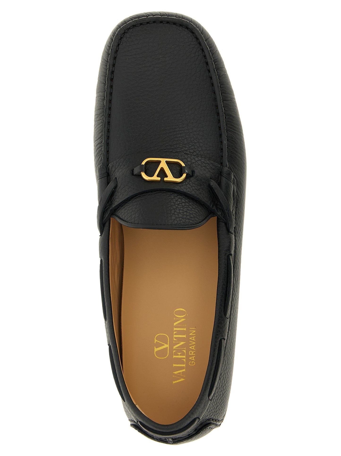 Loafer Slip-On Shoes by Valentino Garavani for men in calfskin leather black & signature features an dynamic silhouette from the V Logo Men's Calfskin Leather Loafer Slip-On Shoes collection, defined by a dynamic and for a dynamic look.