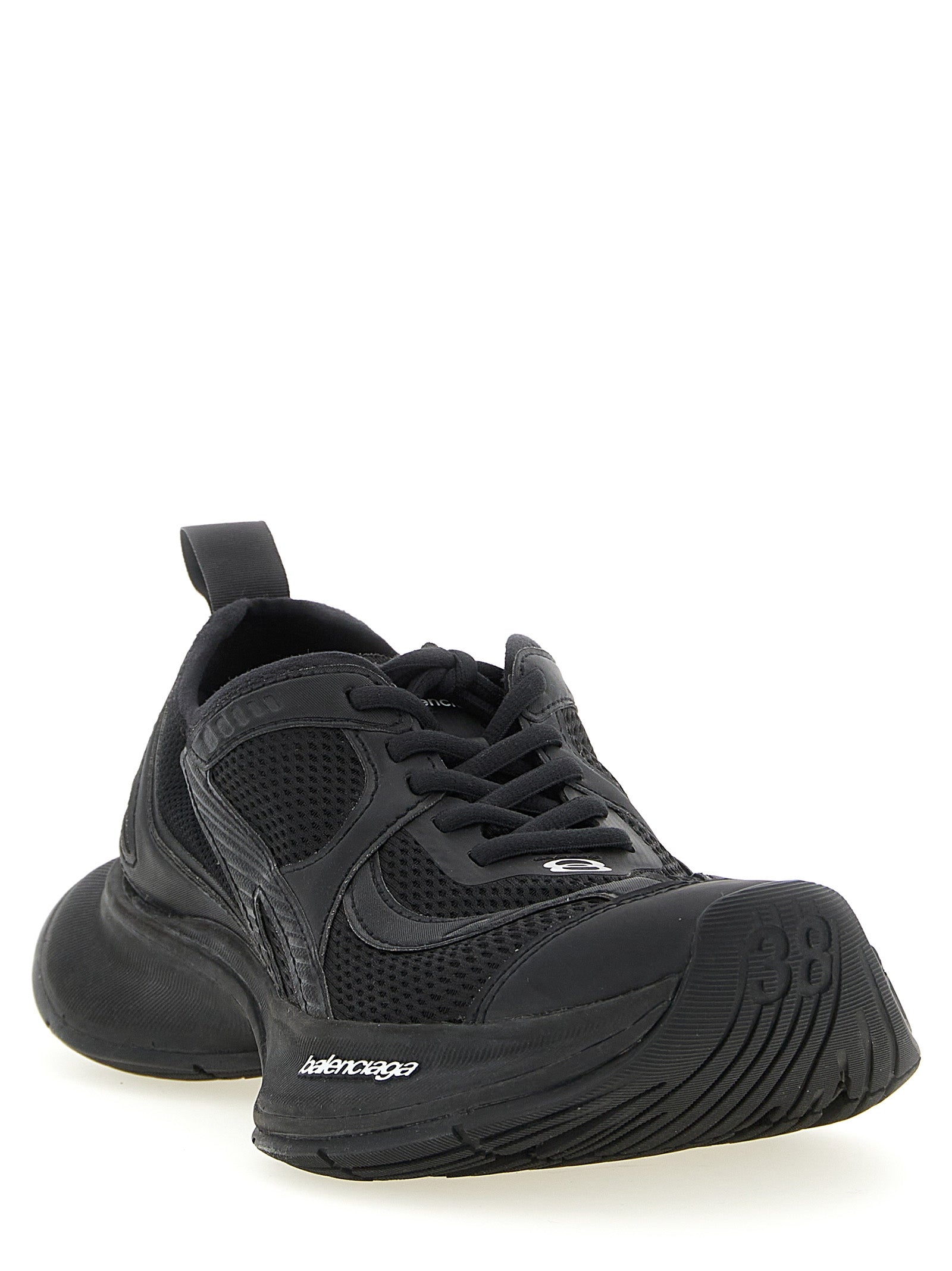 Athletic Sneakers by Balenciaga for women in tu polyester polyurethane & nylon black showcases a architectural silhouette, artfully capturing the essence of the Women's Athletic TU Polyester Polyurethane & Nylon Sneakers with its signature architectural athletic style construction.