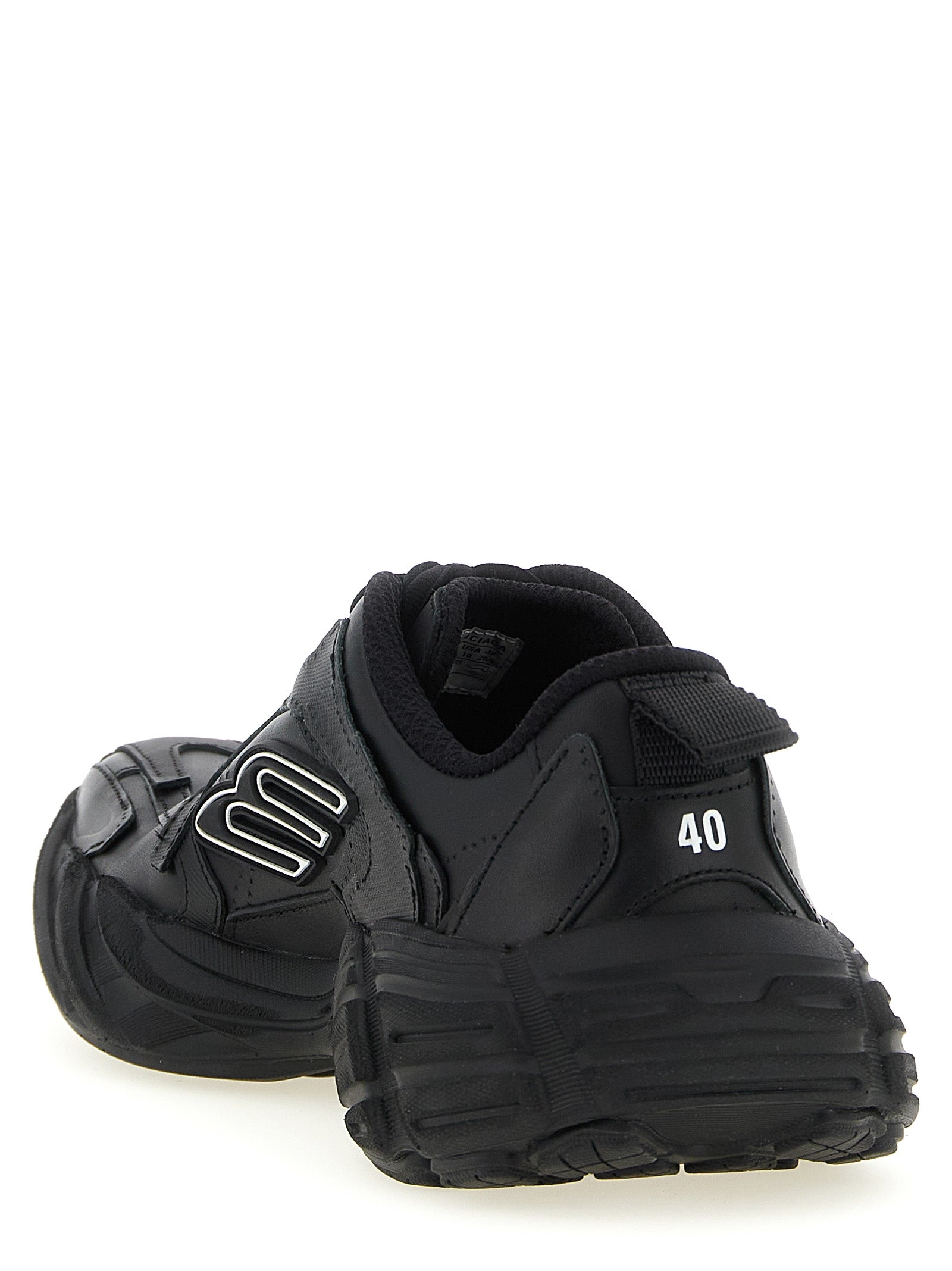 Athletic Sneakers by Balenciaga for women in calfskin leather & polyester black presents a sleek silhouette, perfectly capturing the athletic style essence of Icon Women's Athletic Calfskin Leather & Polyester Sneakers with its sleek design and premium finish.