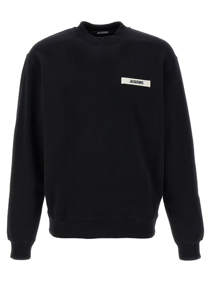 Sweatshirt by Jacquemus for men in cotton black features an provocated silhouette, detailed with a provocated and a refined crew neckline for a sophisticated aesthetic.