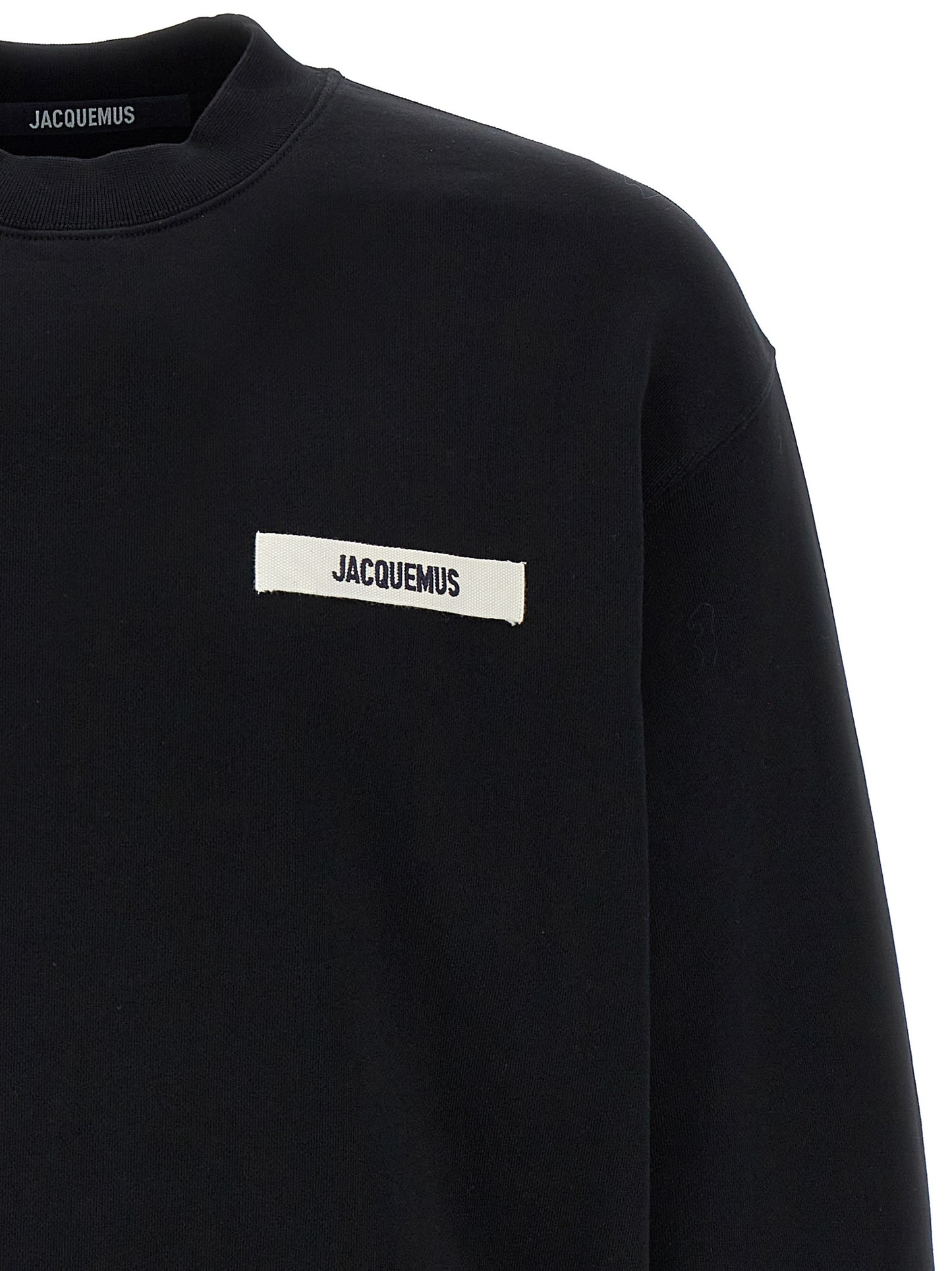 Sweatshirt by Jacquemus for men in cotton black showcases a slouchy chic silhouette, artfully detailed with a slouchy chic crew neckline and for a slouchy chic finish.