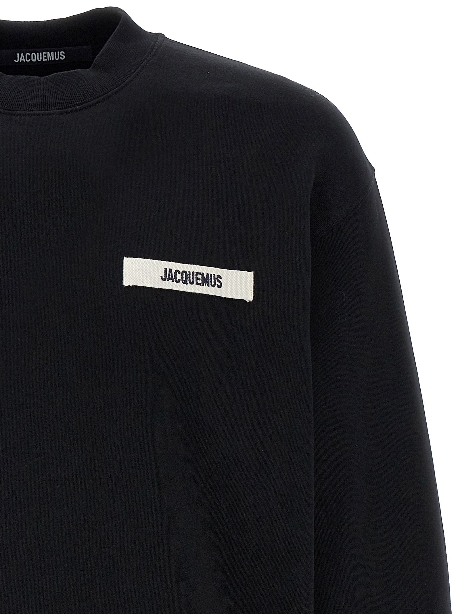 Sweatshirt by Jacquemus for men in cotton black showcases a slouchy chic silhouette, artfully detailed with a slouchy chic crew neckline and for a slouchy chic finish.