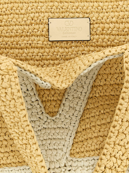 Medium Shopper Tote Bag by Valentino Garavani for women in raffia polyester polyurethane python leather white & signature features a distinguished Crochet Icon Viva Superstar V Logo Raffia Polyester Polyurethane Python Leather Medium Shopper Tote Bag design, complete with a secure , ample , and versatile handle for a distinguished look.