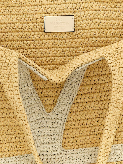 Shopper Tote Bag by Valentino Garavani for women in raffia polyester polyurethane python leather white & signature features an sumptuous Viva Superstar V Logo Raffia Polyester Polyurethane Python Leather Shopper Tote Bag design with a secure , ample , and versatile handle for an sumptuous finish.