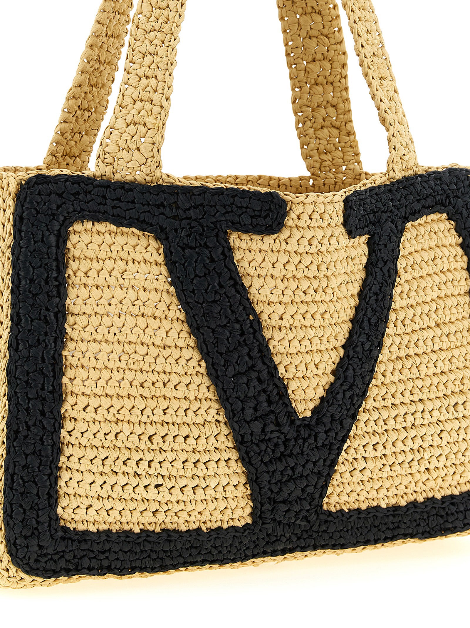 Medium Shopper Tote Bag by Valentino Garavani for women in raffia polyester polyurethane python leather beige & signature features an utilitarian-chic silhouette, showcasing the Crochet Viva Superstar V Logo Raffia Polyester Polyurethane Python Leather Medium Shopper Tote Bag design with a secure , ample , and versatile handle.