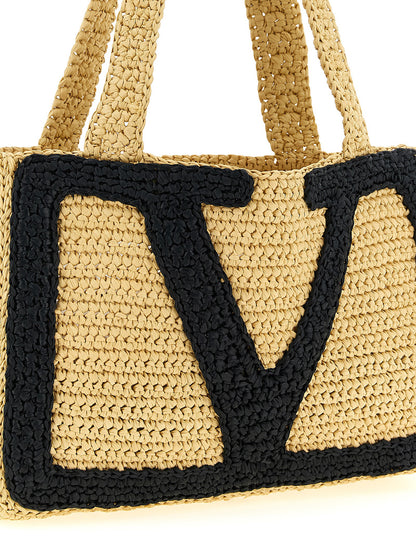 Medium Shopper Tote Bag by Valentino Garavani for women in raffia polyester polyurethane python leather beige & signature features an utilitarian-chic silhouette, showcasing the Crochet Viva Superstar V Logo Raffia Polyester Polyurethane Python Leather Medium Shopper Tote Bag design with a secure , ample , and versatile handle.