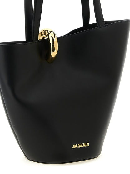 Shoulder Bucket Bag by Jacquemus for women in leather & metal black, gold & patterned features a effortless sophistication silhouette, secured by a clip with ample and versatile shoulder-strap & handle for a effortless sophistication finish.