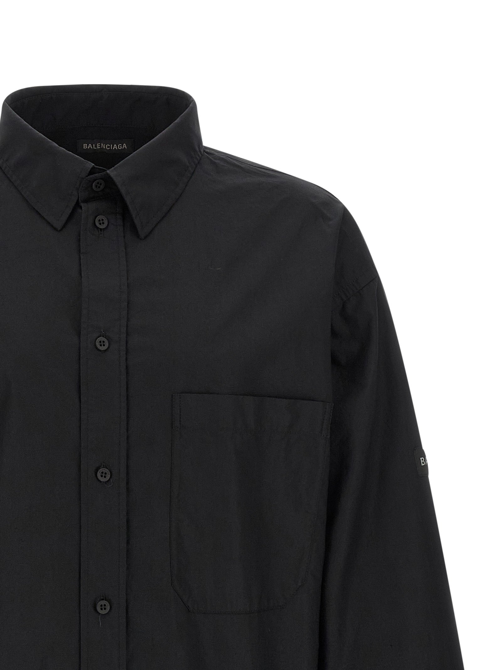 Blouse by Balenciaga for men in cotton black & signature showcases a sharp silhouette, elegantly detailed with a sharp and sharp .