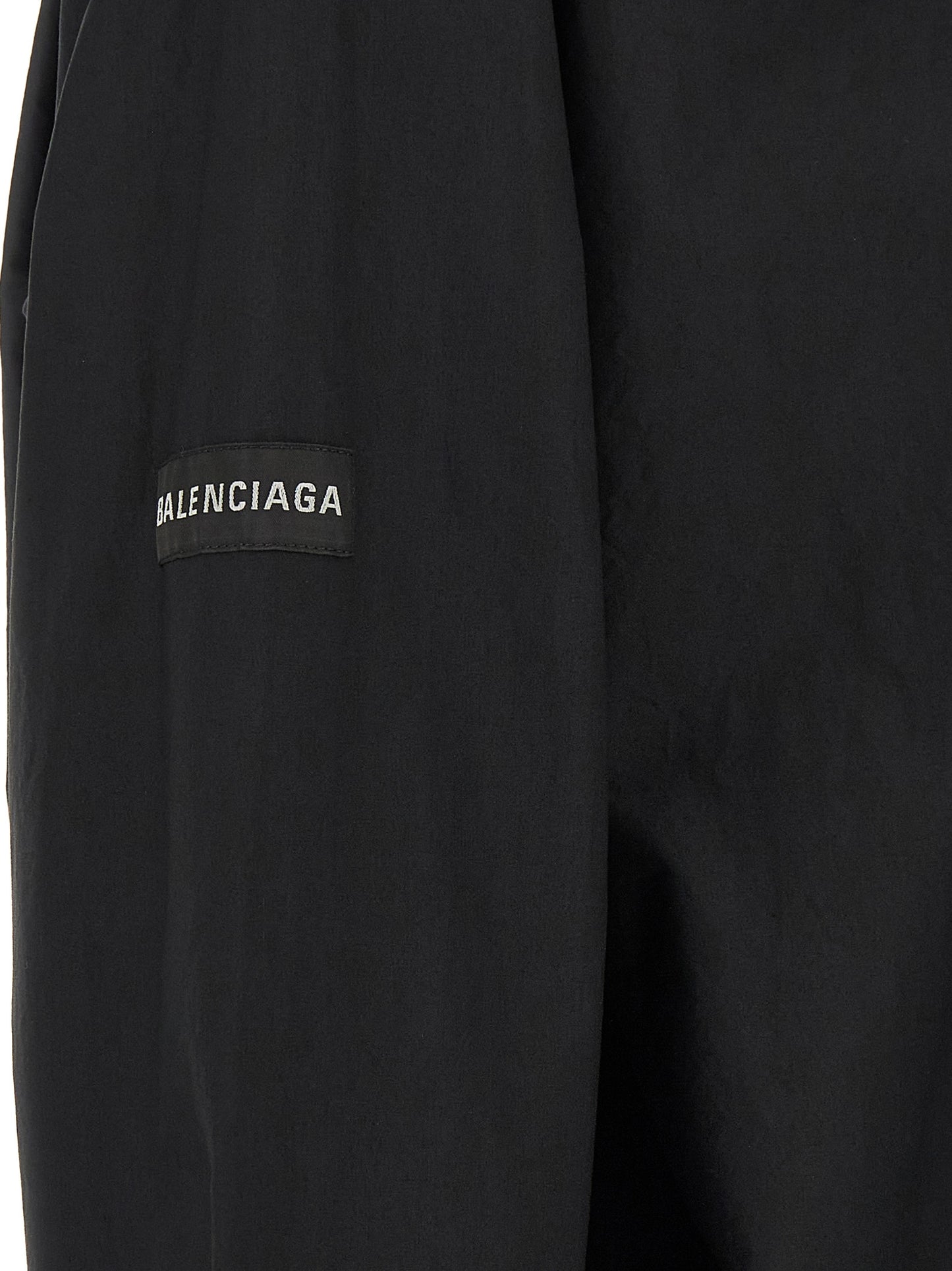 Blouse by Balenciaga for men in cotton black & signature showcases a sharp silhouette, elegantly detailed with a sharp and sharp .