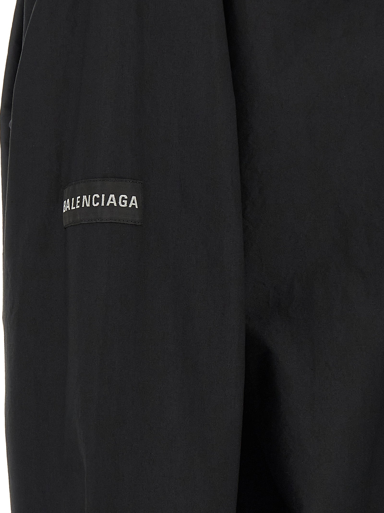 Blouse by Balenciaga for men in cotton black & signature showcases a sharp silhouette, elegantly detailed with a sharp and sharp .