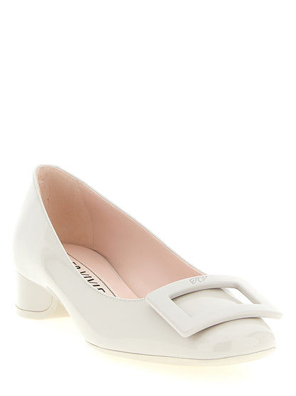 Mid-Heel Pumps Heels by Roger Vivier for women in patent calfskin leather gray & signature features a effortless chic silhouette, showcasing the Women's Patent Calfskin Leather Mid-Heel Pumps Heels design with a effortless chic mid-heel and square toe style for a effortless chic finish.