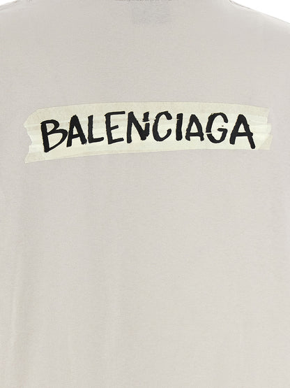 T-Shirt by Balenciaga for women in cotton gray & print showcases a fashionable silhouette, elegantly detailed with a fashionable and for a sophisticated, high-fashion look.