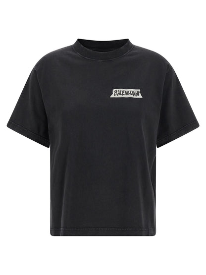 T-Shirt by Balenciaga for women in cotton black & print features an edgy silhouette, meticulously detailed with a sophisticated and for a truly edgy finish.