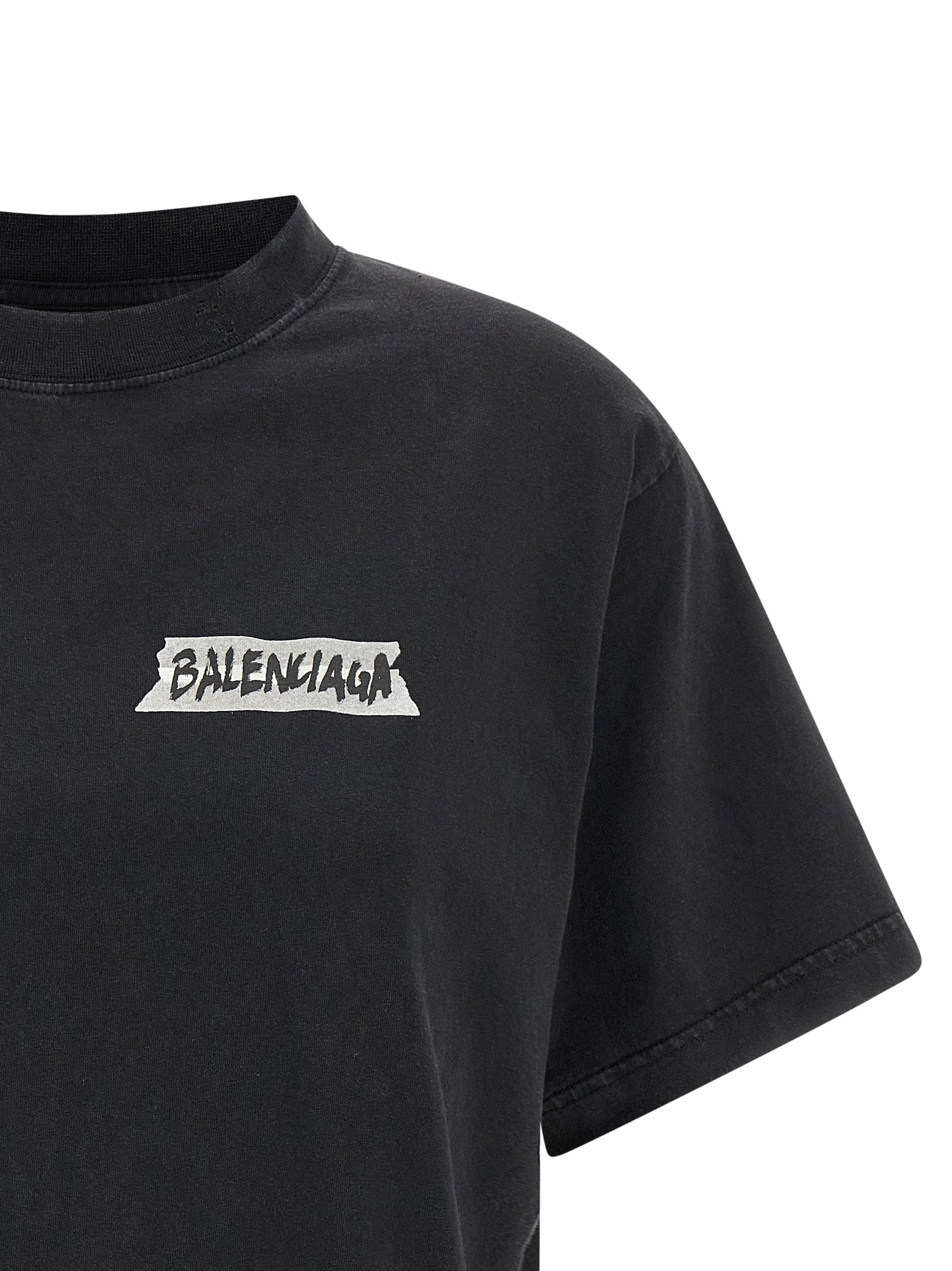 T-Shirt by Balenciaga for women in cotton black & print showcases a dramatic silhouette, elegantly detailed with a dramatic and for a truly dramatic finish.