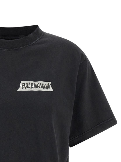 T-Shirt by Balenciaga for women in cotton black & print showcases a dramatic silhouette, elegantly detailed with a dramatic and for a truly dramatic finish.