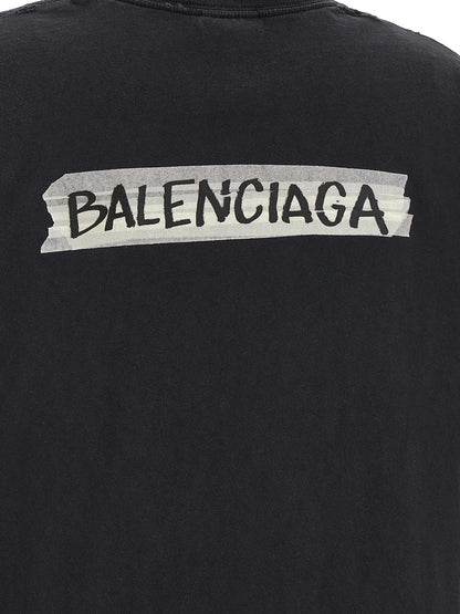 T-Shirt by Balenciaga for women in cotton black & print features an on trend silhouette, perfectly showcasing a on trend and for an elevated aesthetic.