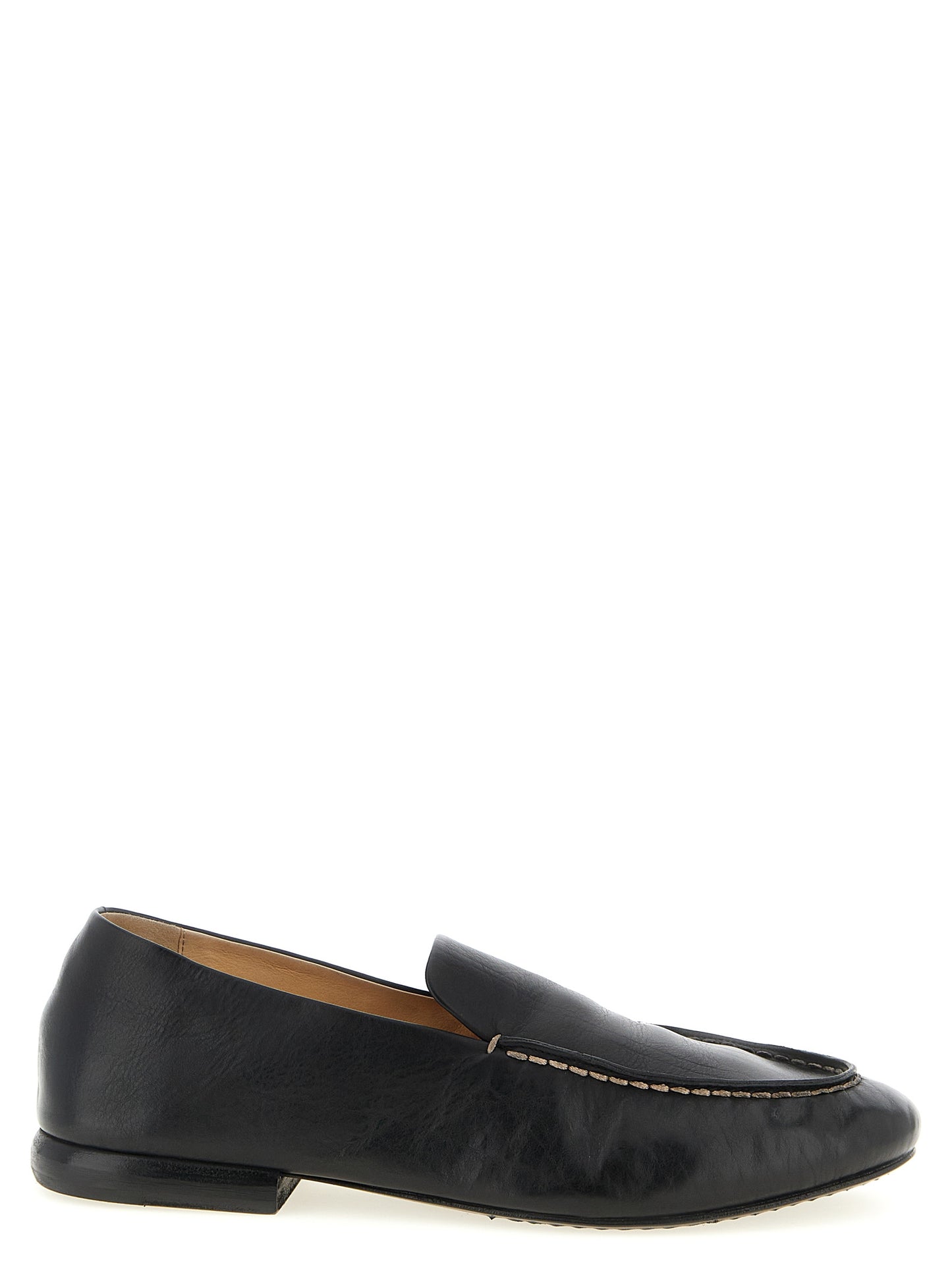 This Loafer Slip-On Shoes by Marsell for men in calfskin leather black features an exquisite silhouette from the Men's Calfskin Leather Loafer Slip-On Shoes collection, defined by a sophisticated and elegant .