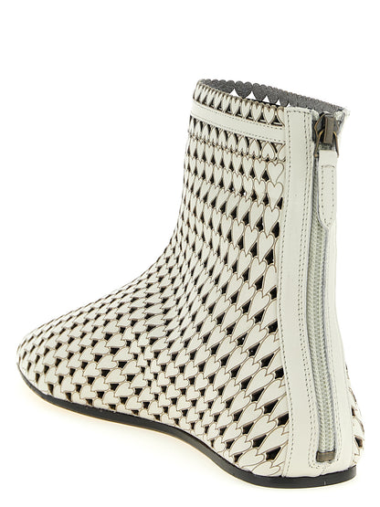 Ankle Boots by Isabel Marant for women in calfskin leather beige features an avant-garde Heart Women's Calfskin Leather Ankle Boots silhouette, defined by a sophisticated and a avant-garde .