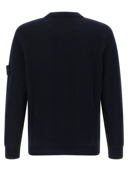 Cardigan by Stone Island for men in organic cotton blue presents a textural silhouette, artfully finished with a textural and for a sophisticated, textural look.