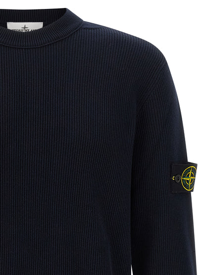 Cardigan by Stone Island for men in organic cotton blue features a dramatic silhouette, showcasing a sophisticated and dramatic detail for a timeless, premium look.
