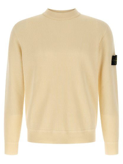 Cardigan by Stone Island for men in organic cotton beige presents a textural silhouette, artfully finished with a textural and for a sophisticated, textural look.