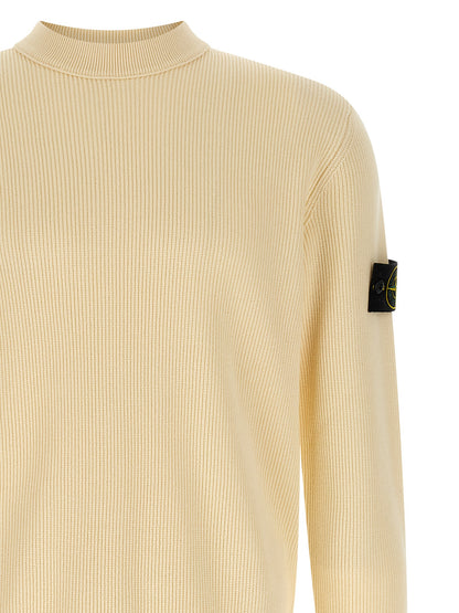 Cardigan by Stone Island for men in organic cotton beige showcases a captivating silhouette, artfully detailed with a captivating and for a truly sophisticated captivating look.