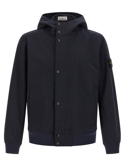 Hooded Windbreaker Jacket by Stone Island for men in stretch polyester canvas blue features an magnificent silhouette, showcasing the sophisticated hooded high-neck neckline and functional pockets, hooded & windproof for a premium, magnificent look.