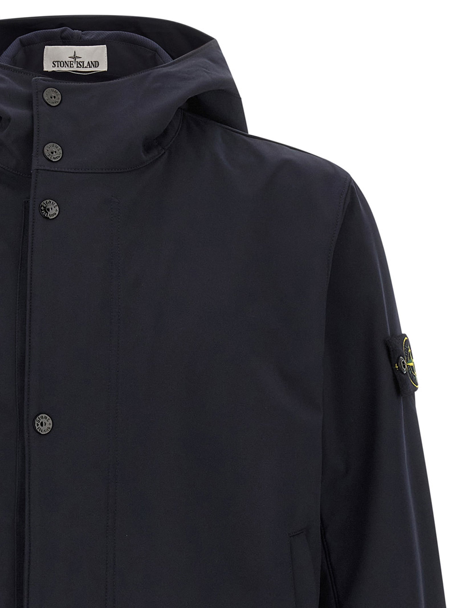 Hooded Windbreaker Jacket by Stone Island for men in stretch polyester canvas blue features an perennial silhouette with a refined hooded high-neck neckline and perennial pockets, hooded & windproof for a sophisticated weather-resistant look.