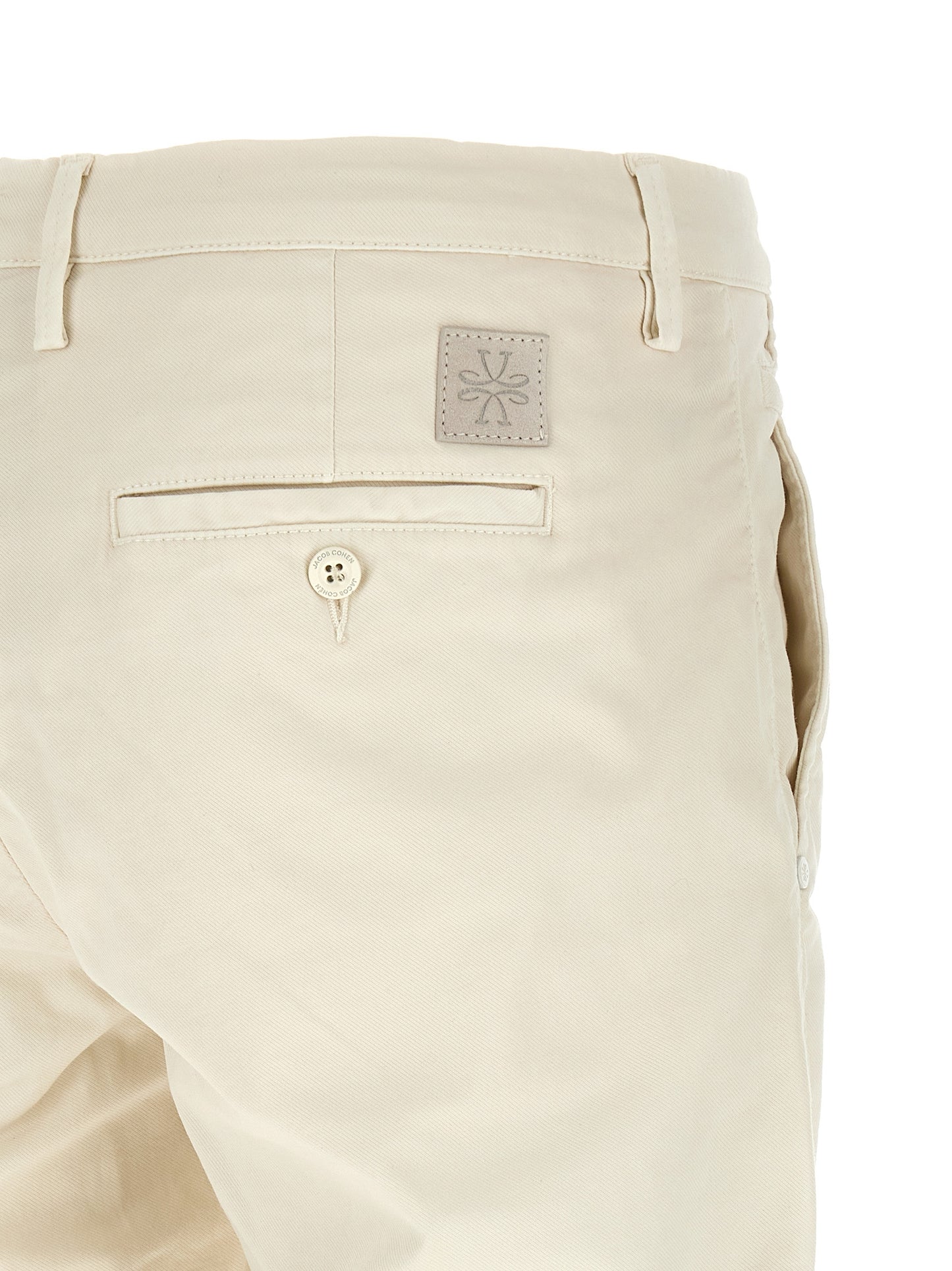 Chinos Pants by Jacob Cohen for men in stretch cotton white features an sharp straight-leg and long with a low rise, highlighting a sharp silhouette for a sophisticated look.