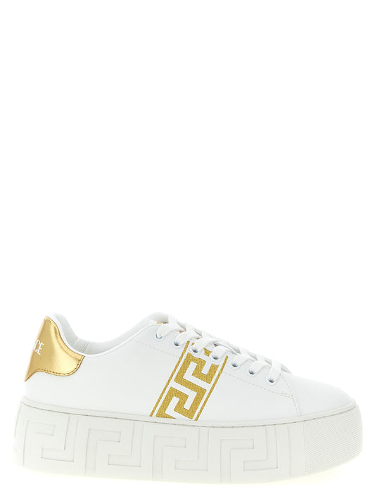 Sneakers by Versace for women in nylon leather gold presents a on trend silhouette from the Women's Fashion Nylon Leather Sneakers collection, showcasing a on trend fashion style for an elevated aesthetic.