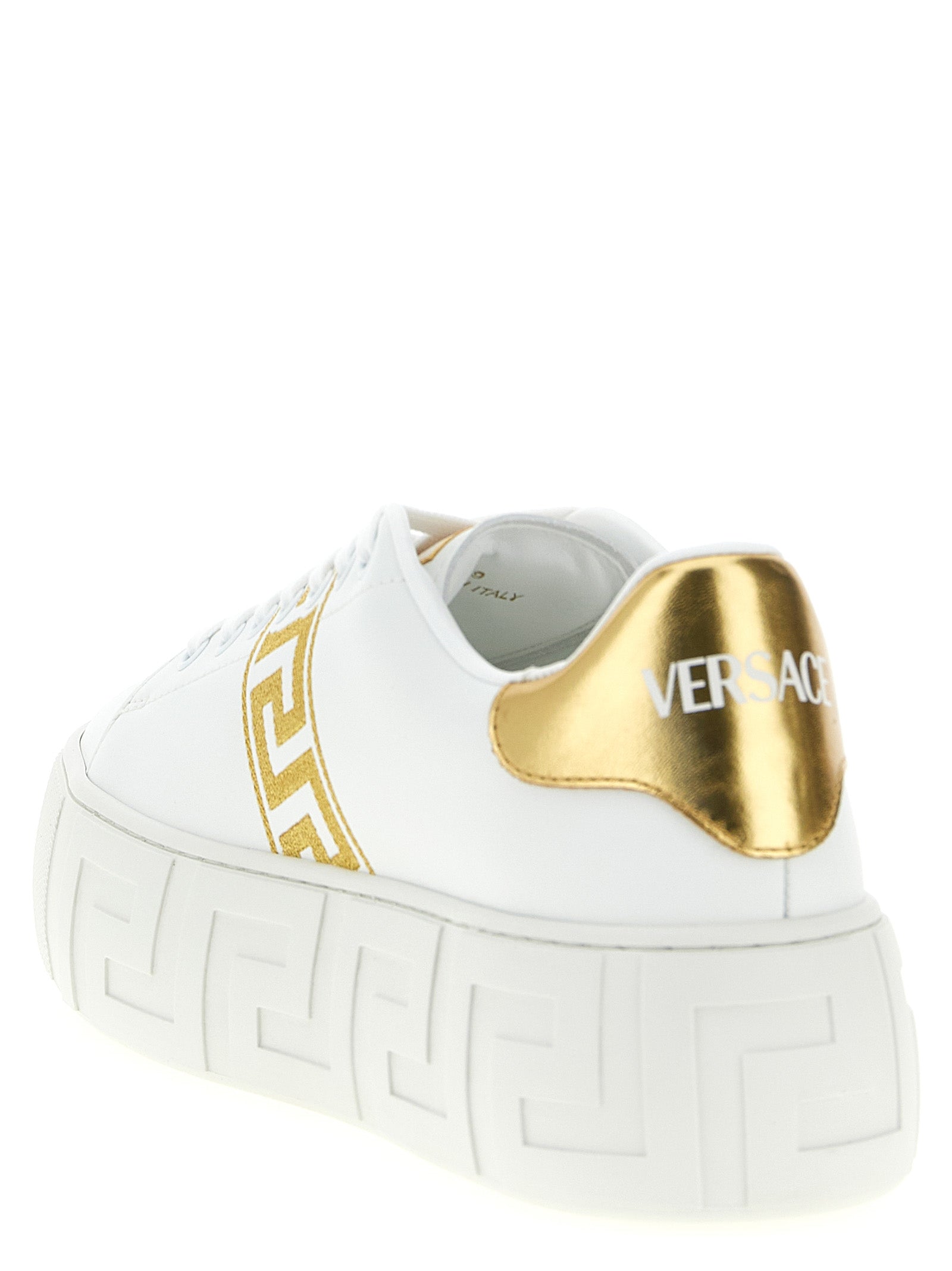 Sneakers by Versace for women in nylon leather gold presents a impeccable silhouette as Women's Fashion Nylon Leather Sneakers, expertly defined by a impeccable fashion style for a impeccable, high-fashion look.