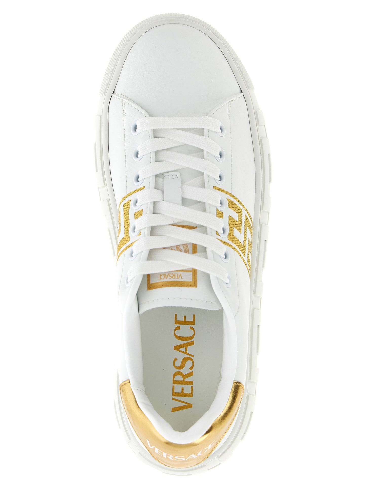 Sneakers by Versace for women in nylon leather gold presents a sumptuous silhouette, artfully capturing the essence of the Women's Fashion Nylon Leather Sneakers with its sumptuous fashion style design.