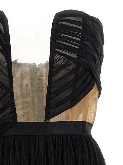 Dress by Nensi Dojaka for women in stretch polyamide viscose black & transparent features a dramatic silhouette, showcasing an elegant split neckline and that flows into a dramatic long.