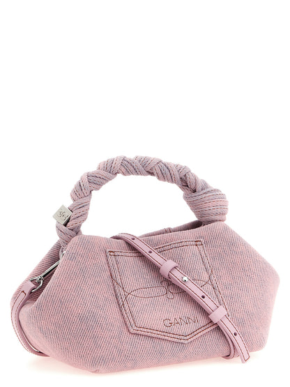This Small Handbag by Ganni for women in stretch organic cotton denim & polyester and multicolor, pink & signature presents a sculptural silhouette featuring a secure , ample , and versatile shoulder-strap, adjustable-strap, detachable-strap & handle for a sculptural finish.