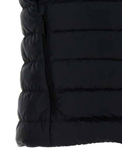 Vest by Canada Goose for women in polyamide & feathers black showcases a utilitarian silhouette, artfully incorporating pockets & insulated and a utilitarian for a truly utilitarian finish.