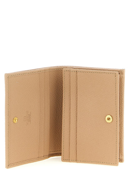 Cardholder Card Case by Valentino Garavani for women in calfskin leather multicolor, pink & signature features a distinguished silhouette, showcasing the distinguished design of the V Logo Calfskin Leather Cardholder Card Case with refined card-organization.