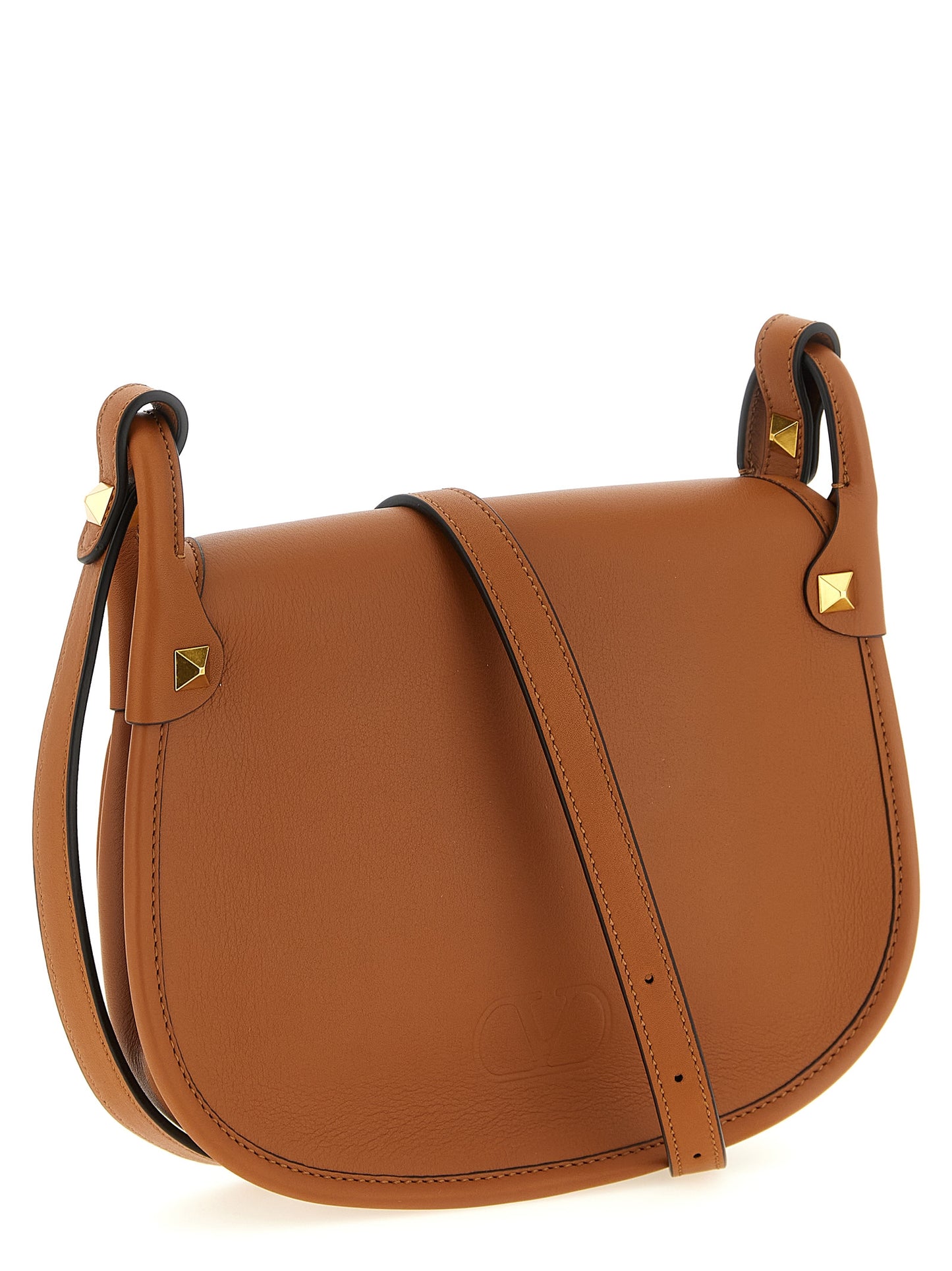Small Shoulder Flap Bag by Valentino Garavani for women in calfskin leather brown & signature features a effortless chic silhouette with a secure flap & magnetic, ample , and versatile shoulder-strap & adjustable-strap for a effortless chic finish.