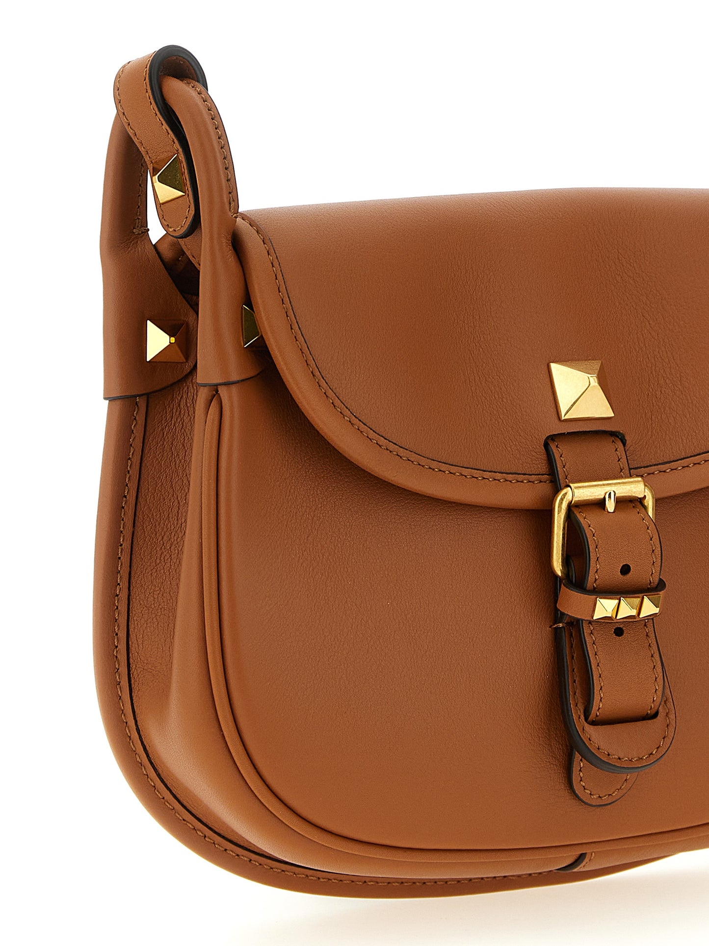 Small Shoulder Flap Bag by Valentino Garavani for women in calfskin leather brown & signature features a distinguished silhouette, showcasing a secure flap & magnetic and distinguished with versatile shoulder-strap & adjustable-strap for a distinguished finish.
