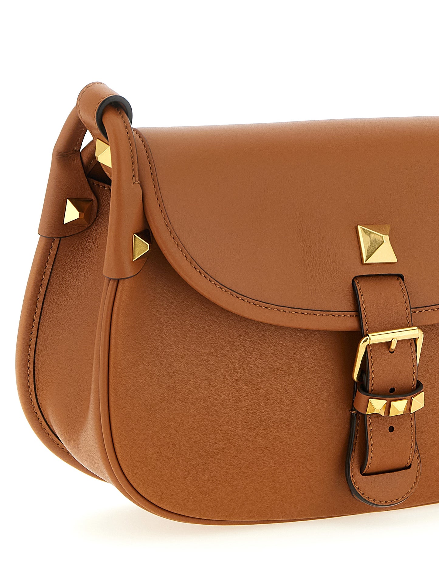 Medium Shoulder Flap Bag by Valentino Garavani for women in calfskin leather brown & signature features a effortless sophistication silhouette, secured by a flap & magnetic with ample and versatile shoulder-strap & adjustable-strap for a effortless sophistication finish.