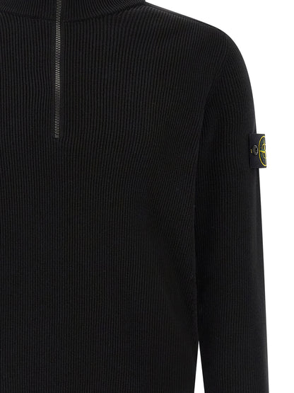 Cardigan by Stone Island for men in organic cotton black features a nuanced silhouette with a refined high-neck neckline and nuanced detailing for a sophisticated look.