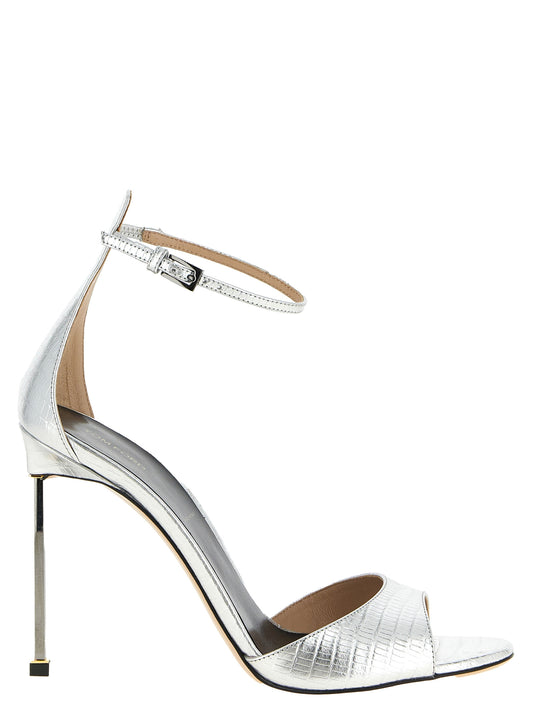 Stiletto Ankle Strap Sandals by Tom Ford for women in steel & leather and silver & print presents a captivating silhouette, showcasing the signature style of the Women's Steel & Leather Stiletto Ankle Strap Sandals with a captivating stiletto and captivating .