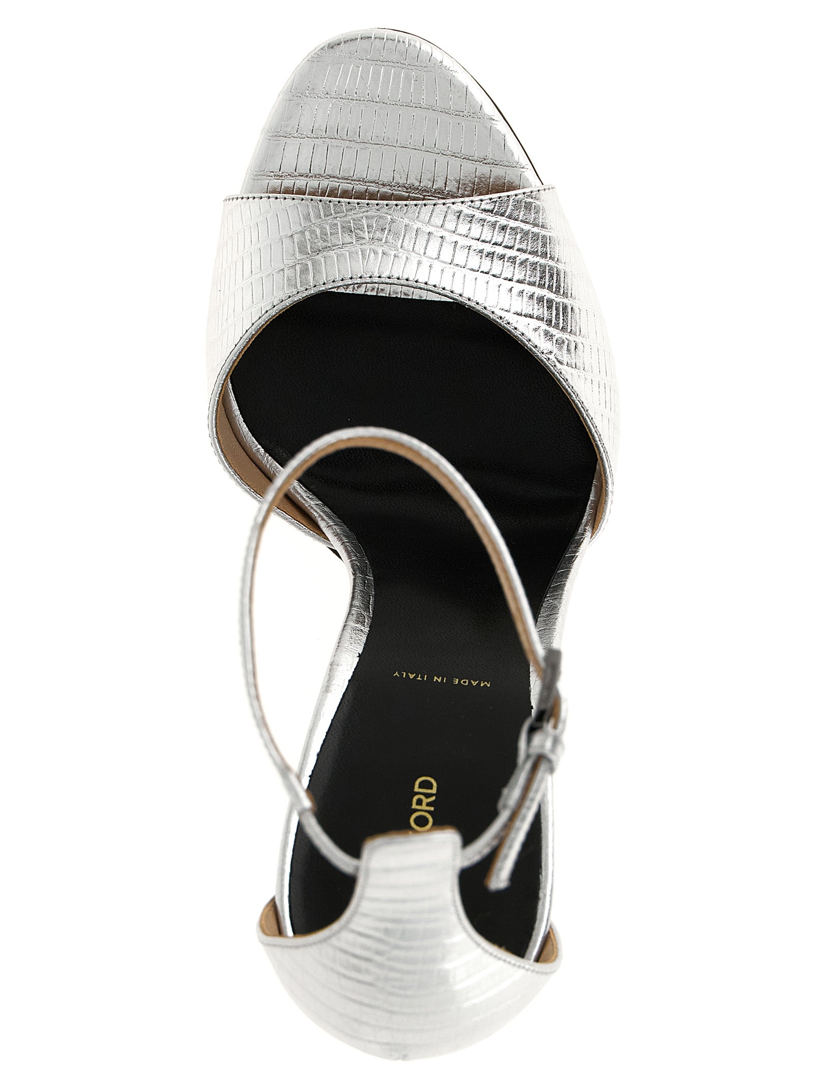 Stiletto Ankle Strap Sandals by Tom Ford for women in steel & leather silver & print presents a sculptural silhouette, showcasing the Women's Steel & Leather Stiletto Ankle Strap Sandals design with a sculptural stiletto and for a premium look.